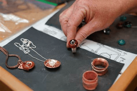 ‍Showcase the artistry behind your jewelry pieces by inviting skilled artisans to demonstrate traditional jewelry-making techniques at your JCK booth