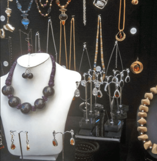 Dark/black backgrounds create a look of elegant luxury to your display at JCK Las Vegas 2024