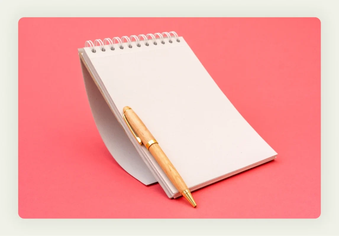 Professional branded pens and notebooks with company logo for trade show marketing